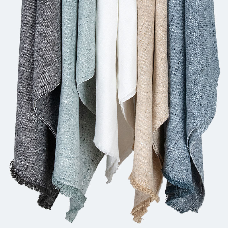 Draped fabrics in a range of colors from the Everyday Basics Collection by Carole Fabrics.
