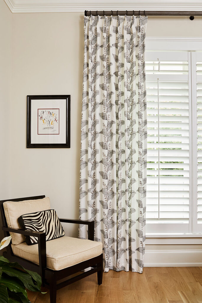 Olivia Pleat EZ Panels in a black and white leaf pattern for a guest bedroom.
